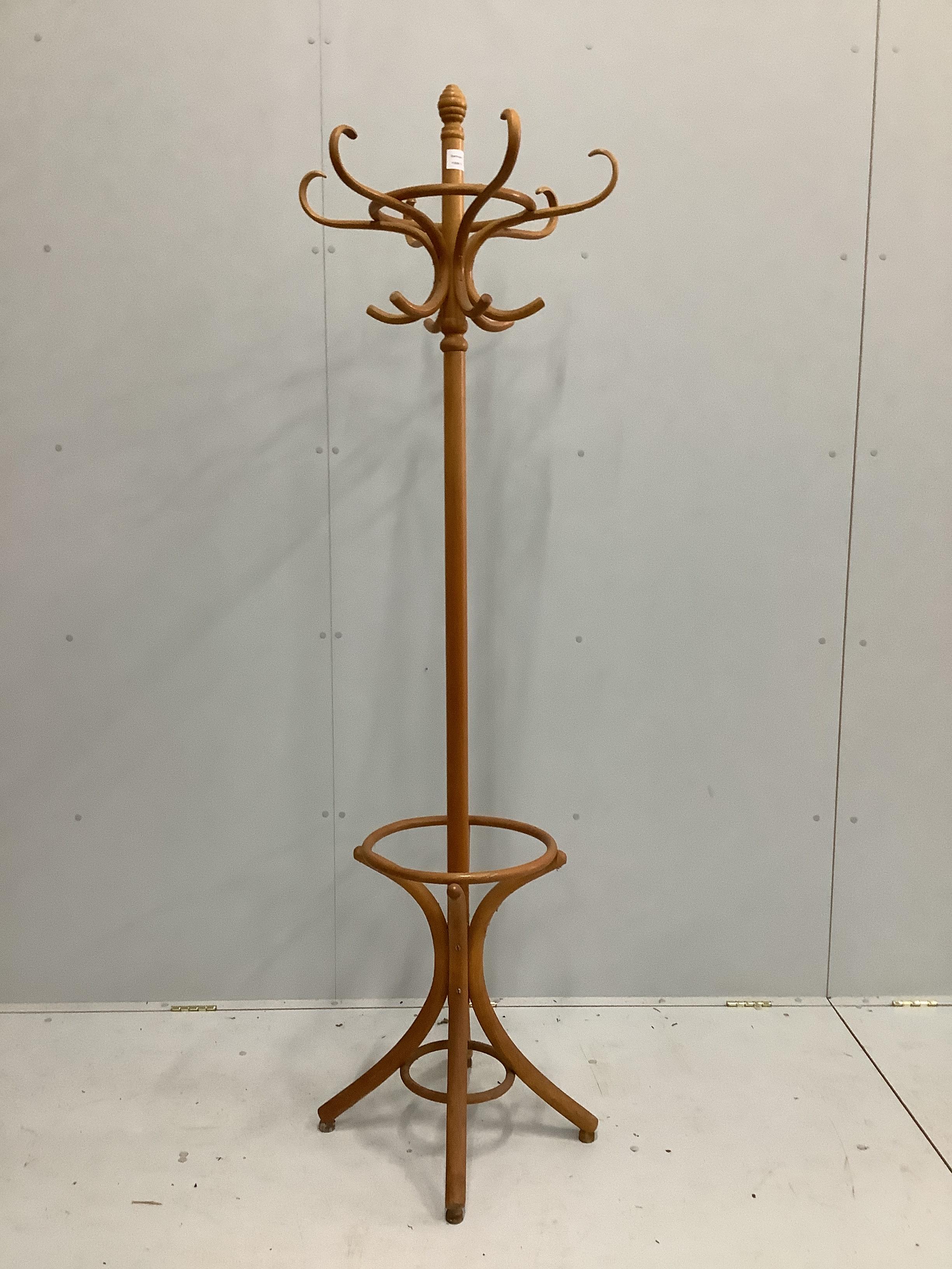 A modern beech bentwood coat and stick stand, height 194cm